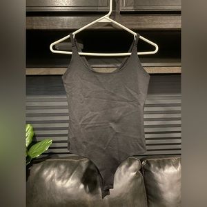 Black body suit size small, new never worn